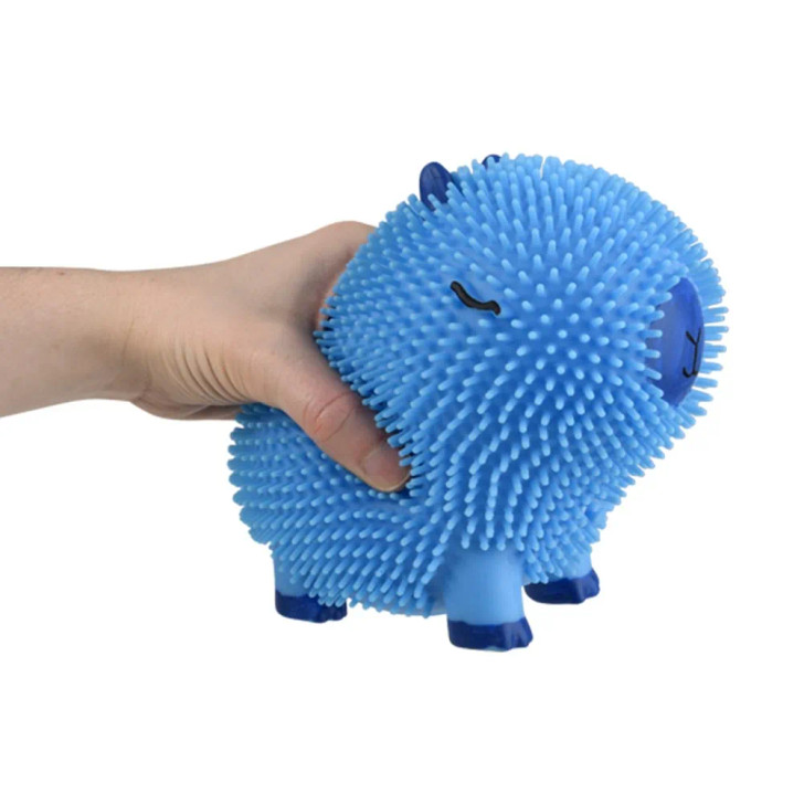 Capybara puffer assorted colors 6" 72 pcs bulk toy gifts blue in hand.