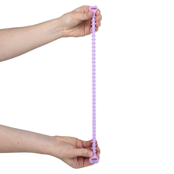 Valentine's stretchy string fidget toy bulk 288 pieces 8 inch 4 colors assorted in use.