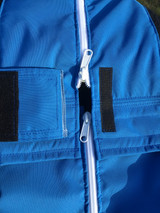 Zipper endpoint protected by Velcro Flap