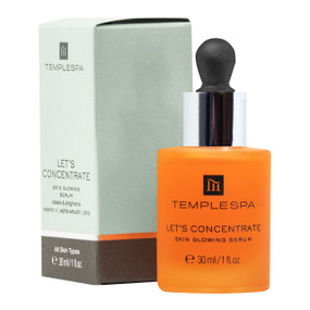 TEMPLESPA Let’s Concentrate - Skin Brightening Serum - green carton box and 30-ml orange glass dropper bottle; a face serum for hyperpigmentation containing alpha arbutin to help  fade age spots & dark spots.