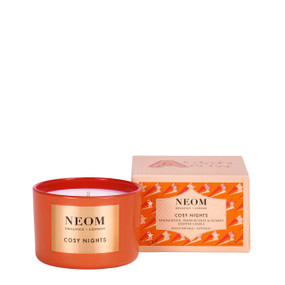 Neom Organics Cosy Nights Travel Candle - orange carton box & 75-Grams orange candle; a complex blend of the purest possible essential oils, designed to help you relax and unwind.