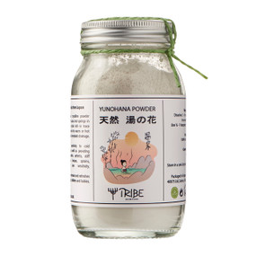 Tribe Skincare Yunohana Natural Hot Spring Bath Powder - 120-Grams jar with white powder; a unique medicinal bathing powder extracted from hot springs in Japan.