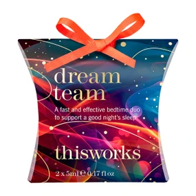 This Works Dream Team bedtime sleep gift set in colourful pillow box packaging tied with a bright orange ribbon on a plain white background.