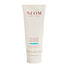 Neom Real Luxury Magnesium Body Butter, 200 ml, in a pink plastic tube; expertly formulated with the wonder mineral magnesium and skin-softening oils to revitalise, nourish and hydrate skin