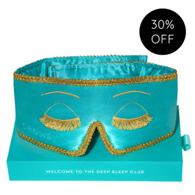 Turquoise drowsy sleep mask on turquoise drowsy sleep mask boxed; Silk Sleep Mask blocks out 100% of light, while the heavenly padded lining cushions the eyes and muffles sound, which helps to promote a deeper and better quality of sleep.