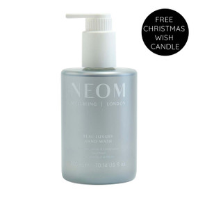 Neom Real Luxury Hand Wash 300ml in a transparent plastic pump bottle; deeply nourishes and hydrates your hands