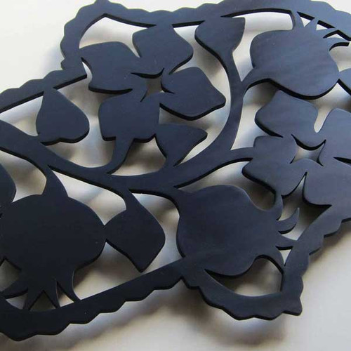 Black Aluminum Hamsa Trivet with pomegranate motif by Melanie Dankowicz Black Aluminum Hamsa Trivet with pomegranate motif by Melanie Dankowicz