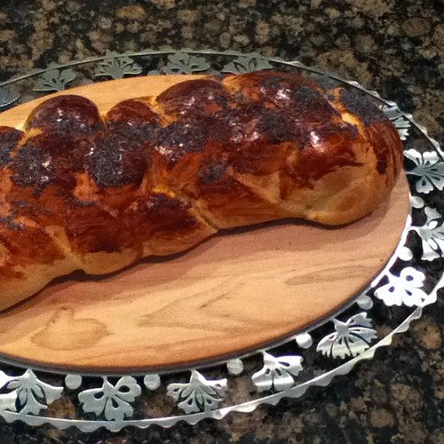 Jubilant Challah Board featuring challah loaf design by Melanie Dankowicz