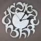 Stainless Steel Hebrew Wall Clock by Melanie Dankowicz