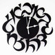 Black Hebrew Clock in Laser-Cut Stainless Steel by Melanie Dankowicz
