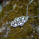Pomegranate Hamsa Pendant on moss — Melanie Dankowicz Pomegranate Hamsa Pendant on moss — Melanie Dankowicz