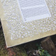 Garden Ketubah in Gold close-up at wedding by Melanie Dankowicz Garden Ketubah in Gold close-up at wedding by Melanie Dankowicz