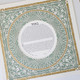 The Festive Delight Ketubah in sage green and gold on angle -  Melanie Dankowicz