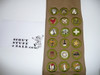 1930's Boy Scout Merit Badge Sash with 36 square merit badges cut to round