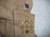 Teens Eisner Jacket with collar brass, 1st Class Patrol Leader, merit badges, early Patrol emblem and Type 1 Life and Star Patches