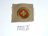 First Aid - Type A - Square Tan Merit Badge (1911-1933)