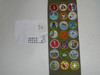 1980's Boy Scout Merit Badge Sash with 21 rolled edge Merit badges, #70