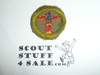Wood Carving - Type A - Square Tan Merit Badge (1911-1933), cut to round