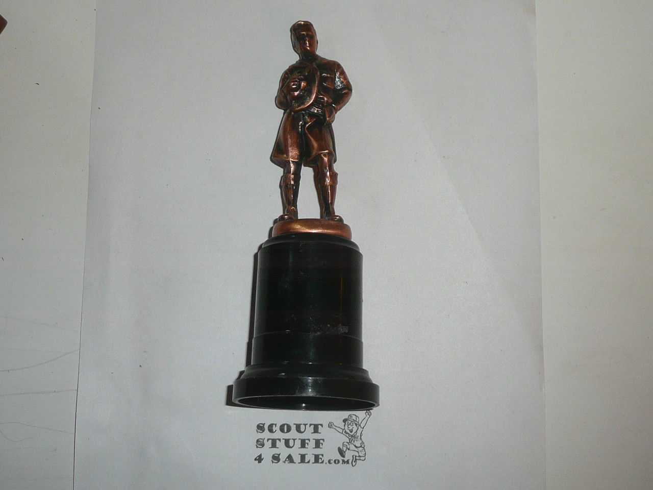 1960s mckenzie, bronze finish, 5.5 high by 1.7 wide, tall base