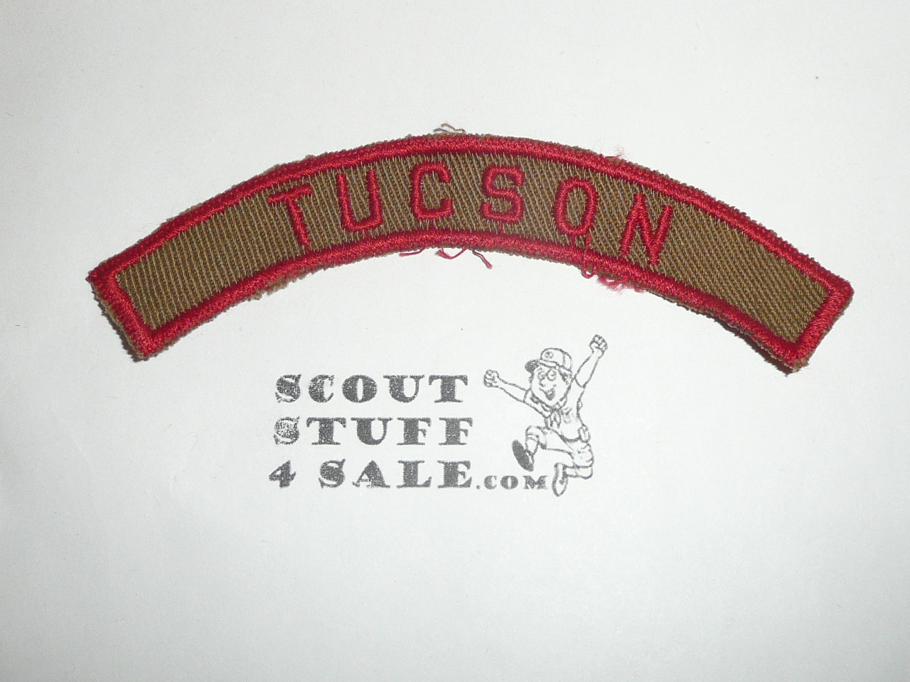 TUCSON Khaki and Red Community Strip