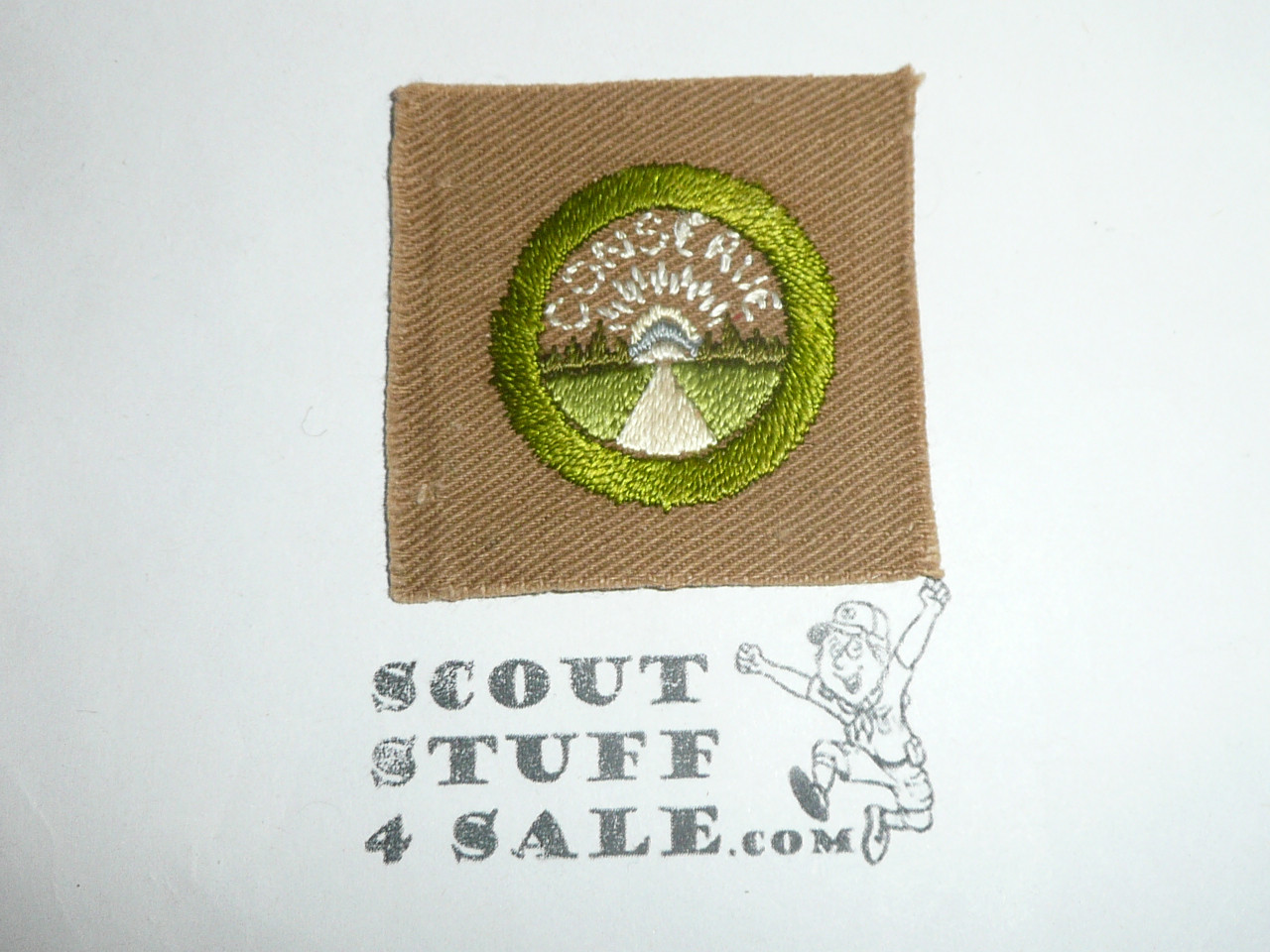 Conservation - Type A - Square Tan Merit Badge (1911-1933), near mint