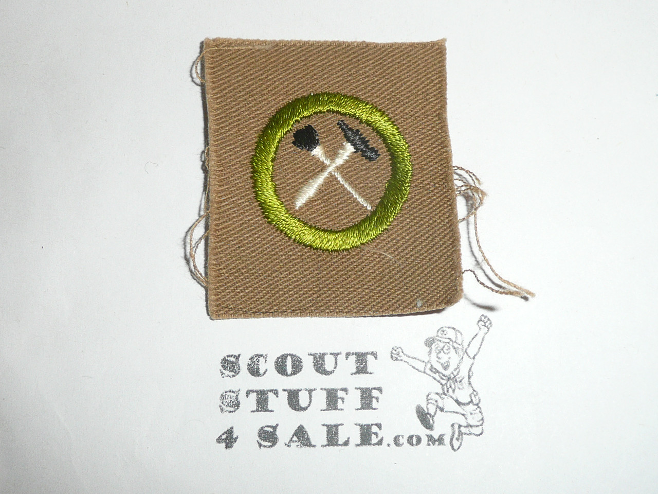 Handicraft / Home Repairs - Type A - Square Tan Merit Badge (1911-1933), black striped back