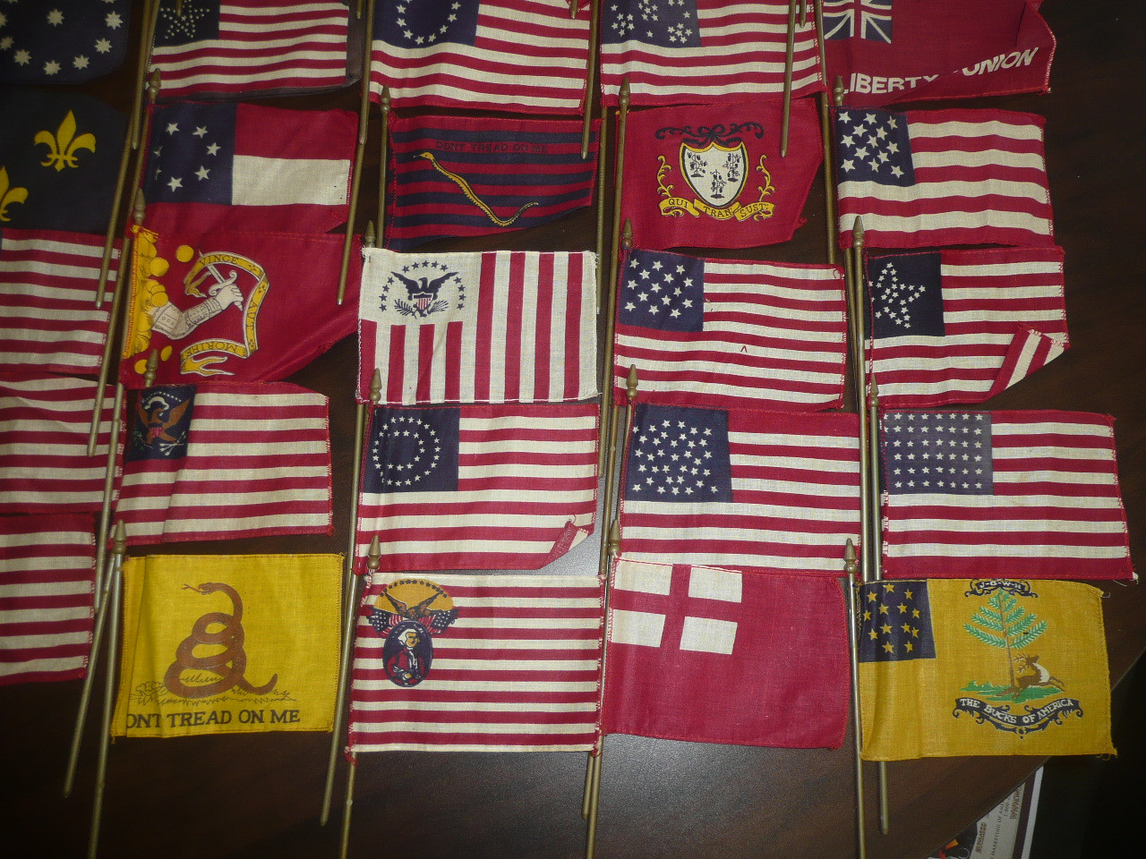Assortment of 43 different Historical USA Flags for decoration or banquet table tops