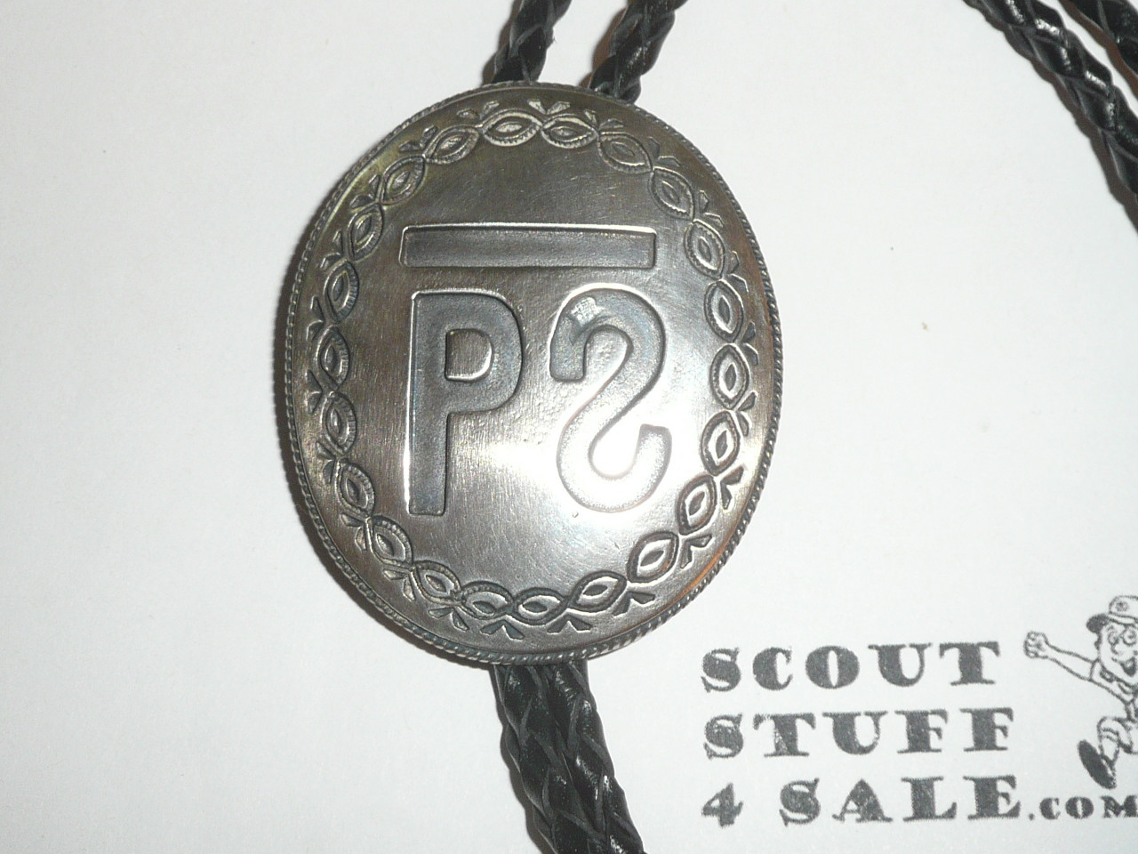Philmont Scout Ranch,STERLING Silver Philmont Brand Bolo tie with braided leather cord and silver tips