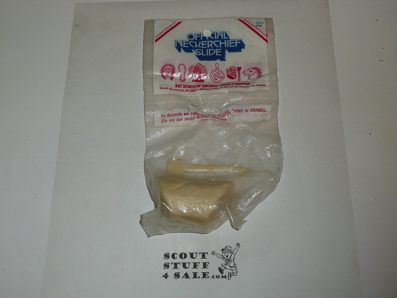 Axe and Log Neckerchief Slide, Molded Plastic, new in package