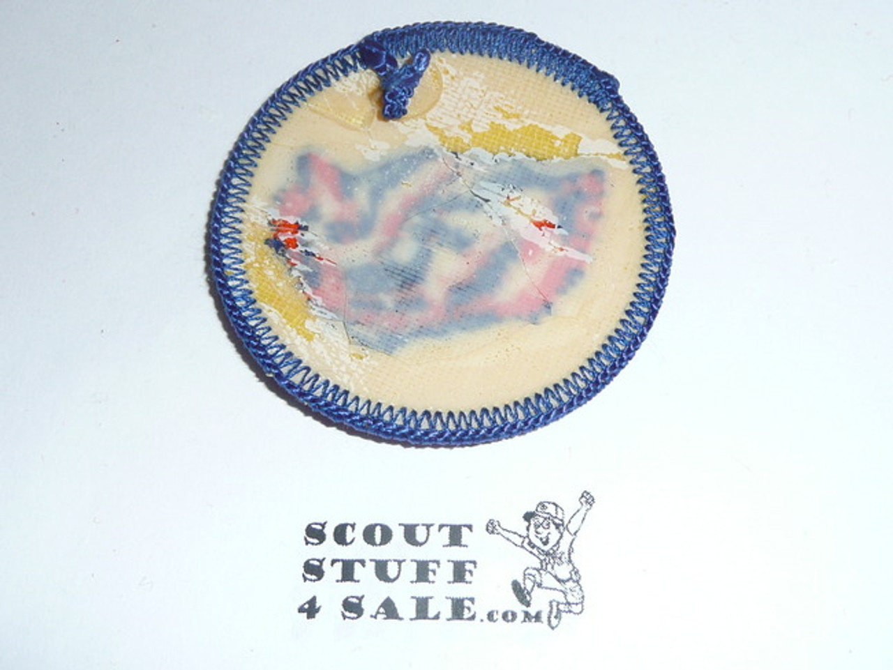 Badger Patrol Medallion, Yellow Twill with plastic back, 1972-1989