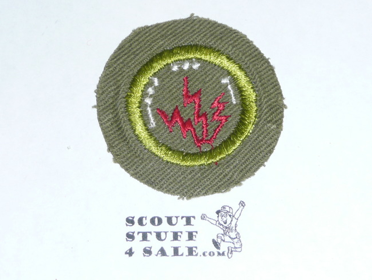 Radio - Type E - Khaki Crimped Merit Badge (1947-1960)