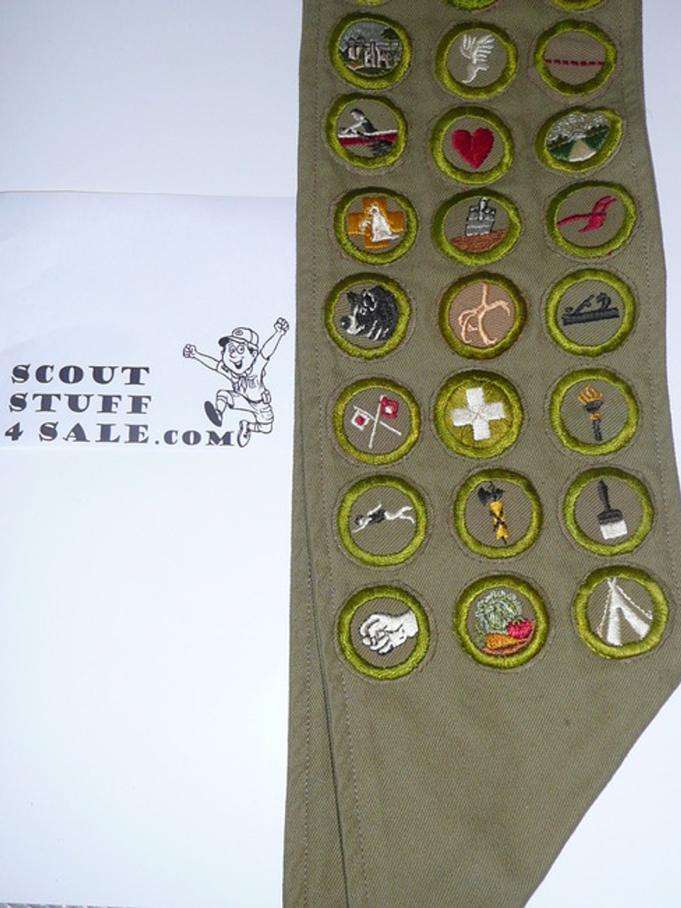 1940's Boy Scout Merit Badge Sash with 61 crimped merit badges.  Includes Soil Mgt, rocks/minerals & cement work.  Also has stalking and taxidermy square cut to round