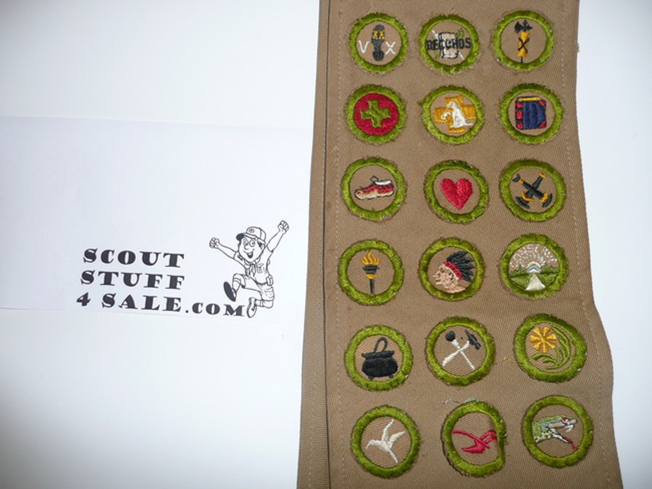 1930's Boy Scout Merit Badge Sash with 36 square merit badges cut to round