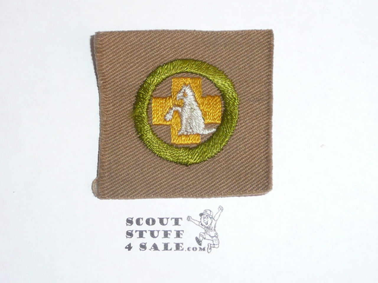 First Aid to Animals - Type A - Square Tan Merit Badge (1911-1933)