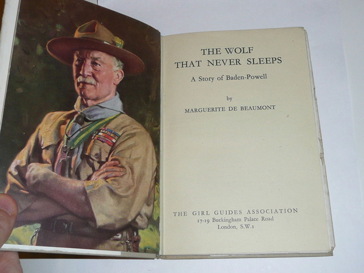 1951 The Wolf that Never Sleeps, by Marguerite De Beaumont, 5th printing, with dust jacket, pencil notes on table of contents page but otherwise unmarked