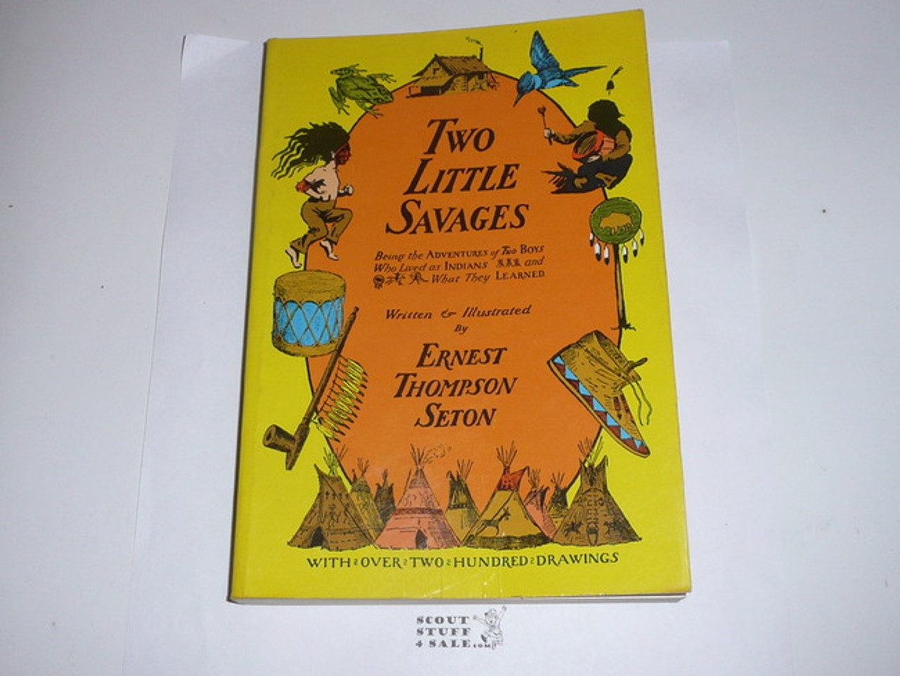 Two little savages : being the adventures of two boys who lived as