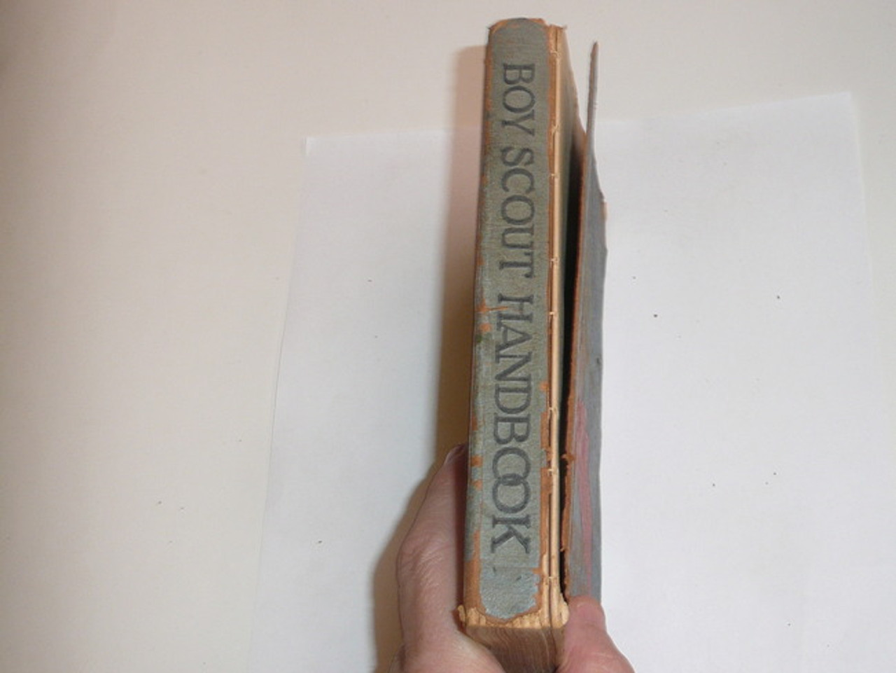 1930's Boy Scout Handbook, Third Edition, Printing unknown because title page is missing, Norman Rockwell Cover, cover chipped and separated from spine, good reading copy