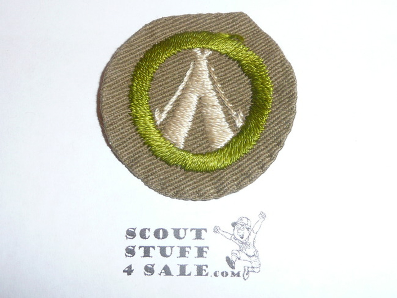 Camping - Type B - Wide Crimped Bdr Tan Merit Badge (1934-1935), was sewn but in very good condition