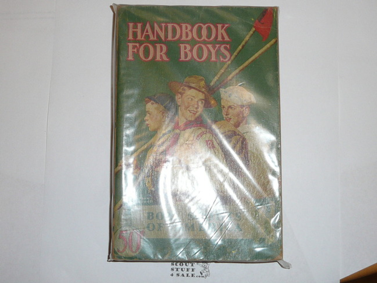 1943 Boy Scout Handbook, Fourth Edition, Thirty-sixth Printing, Norman Rockwell Cover, very good-near mint condition (some edge wear), distributed by American News Co.