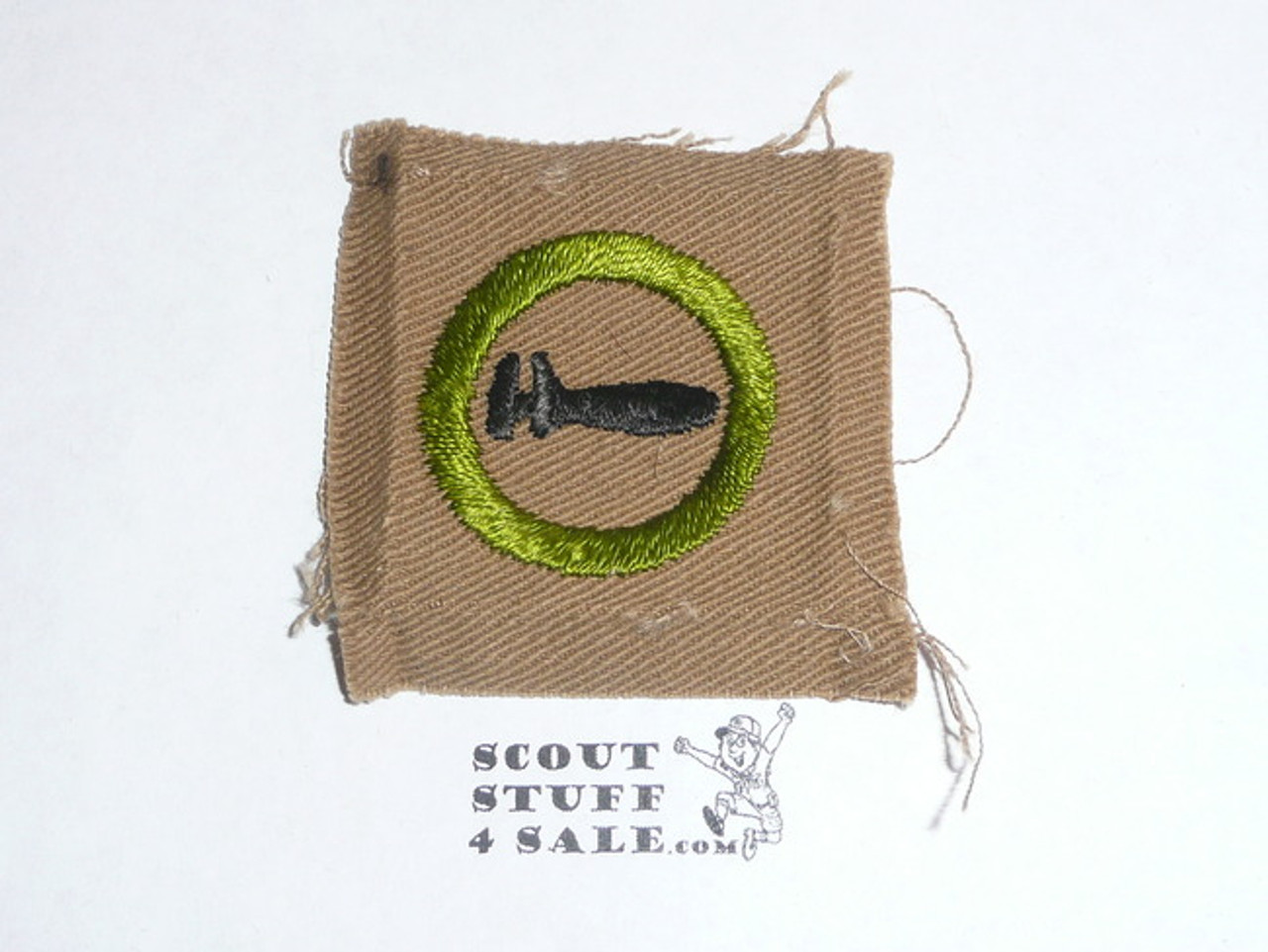 Machinery - Type A - Square Tan Merit Badge (1911-1933), lt use