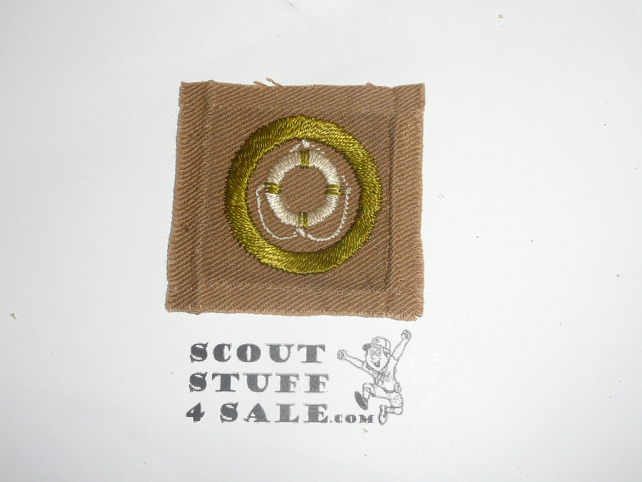 Lifesaving - Type A - Square Tan Merit Badge (1911-1933), lt use