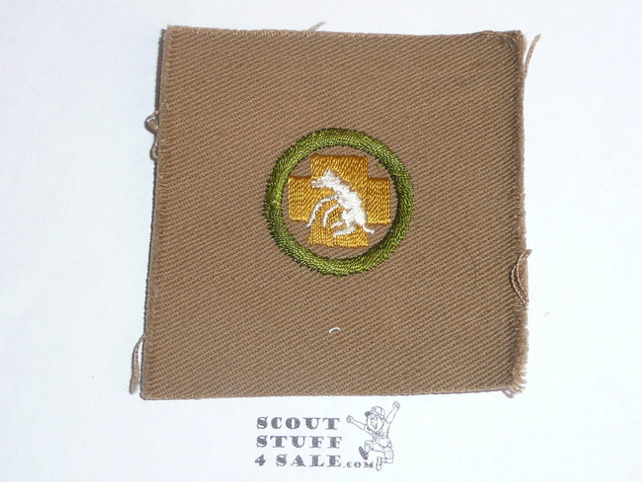 First Aid to Animals - Type A - Square Tan Merit Badge (1911-1933), TEENS variety, huge piece of cloth, brown striped back