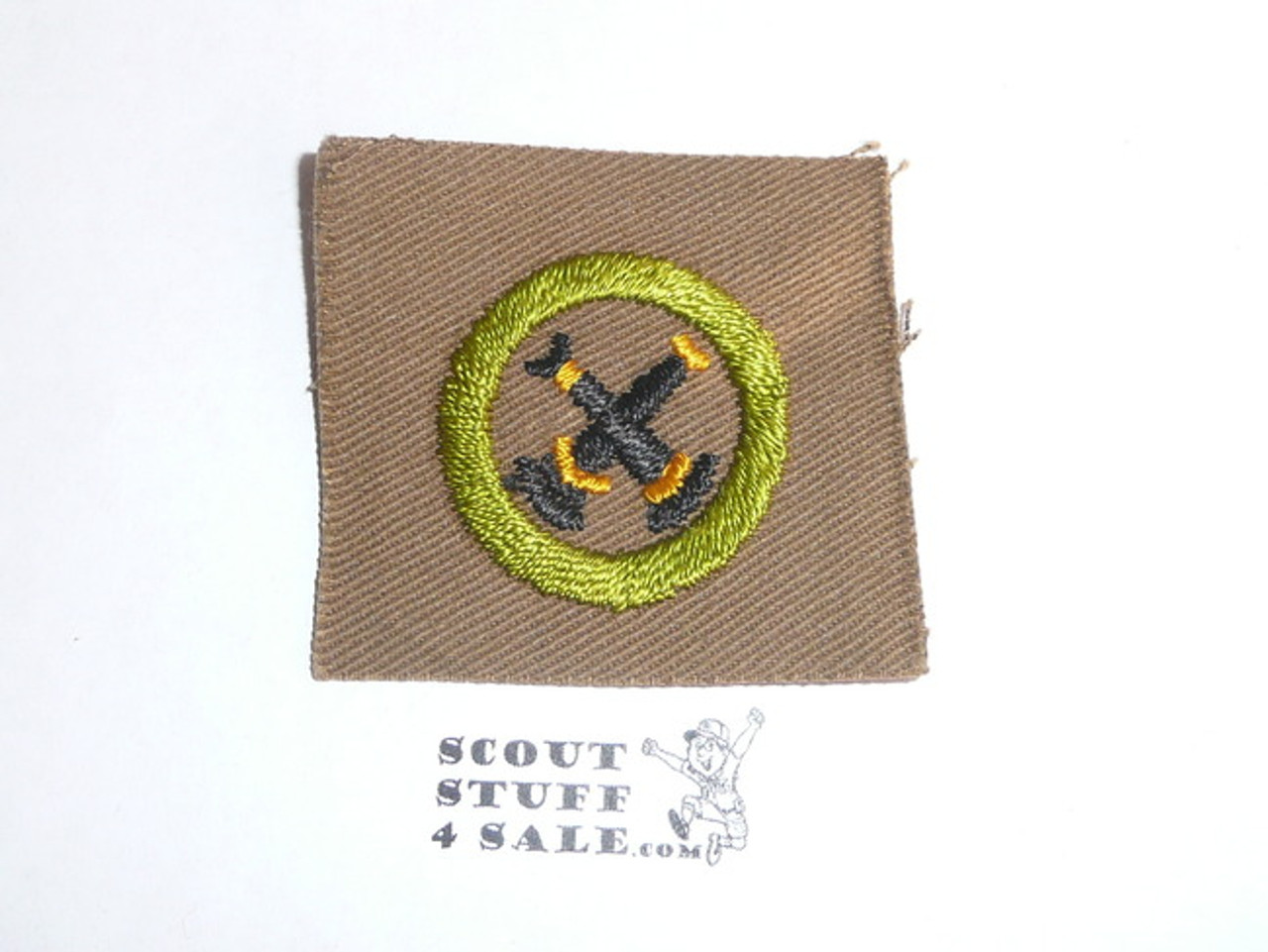 Firemanship - Type A - Square Tan Merit Badge (1911-1933), black striped back