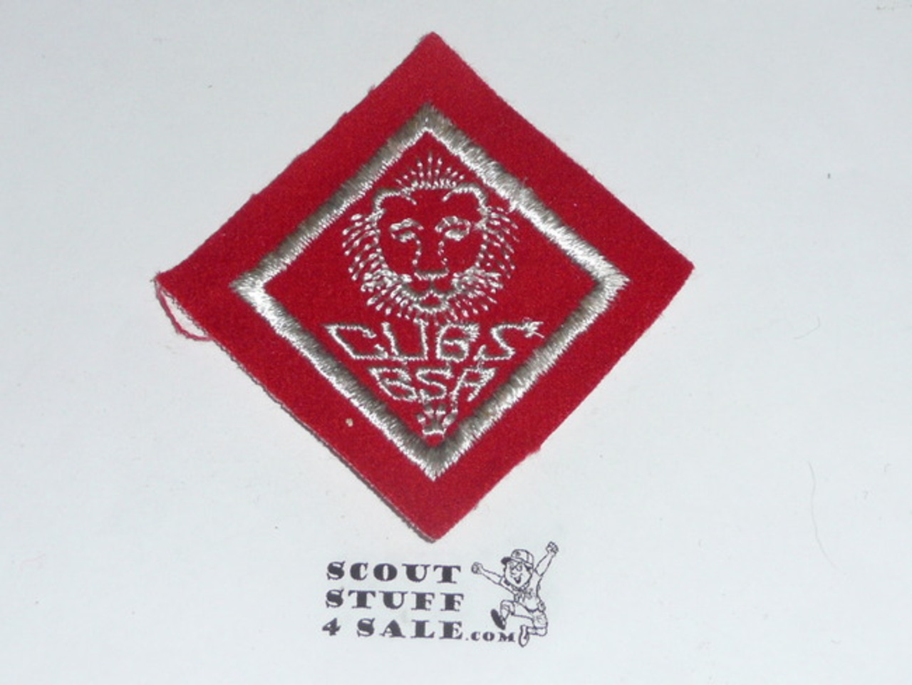 Lion Cub Scout Rank, felt with material extending over edge, EARLY