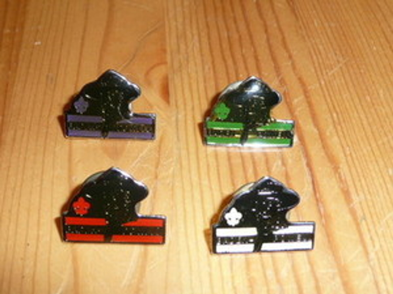 4 Baden Powell Bust Pins each in a different color - Scout