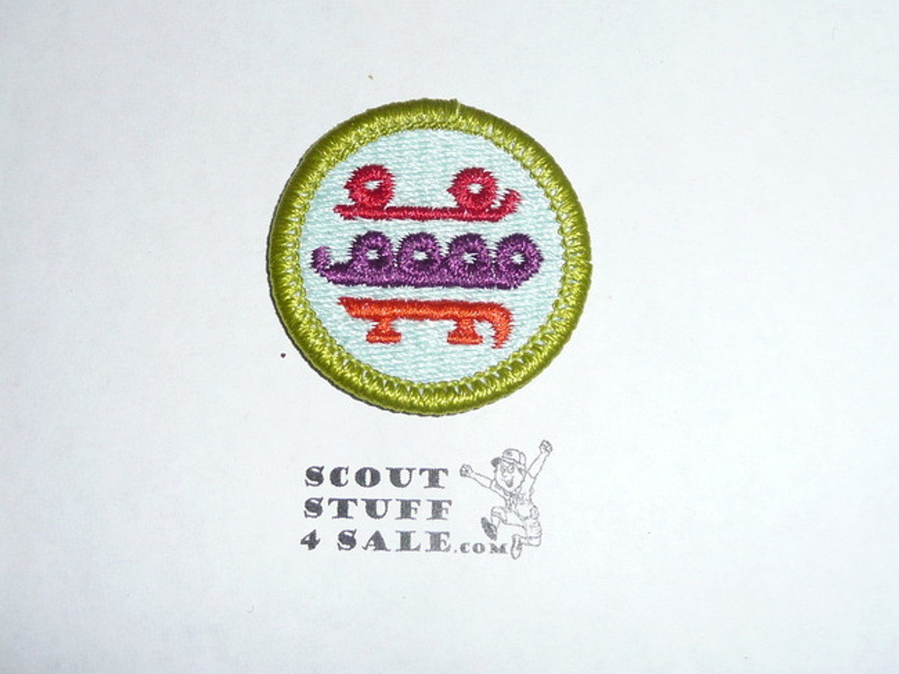 Skating (bright colors)- Type H - Fully Embroidered Plastic Back Merit Badge (1972-2002)