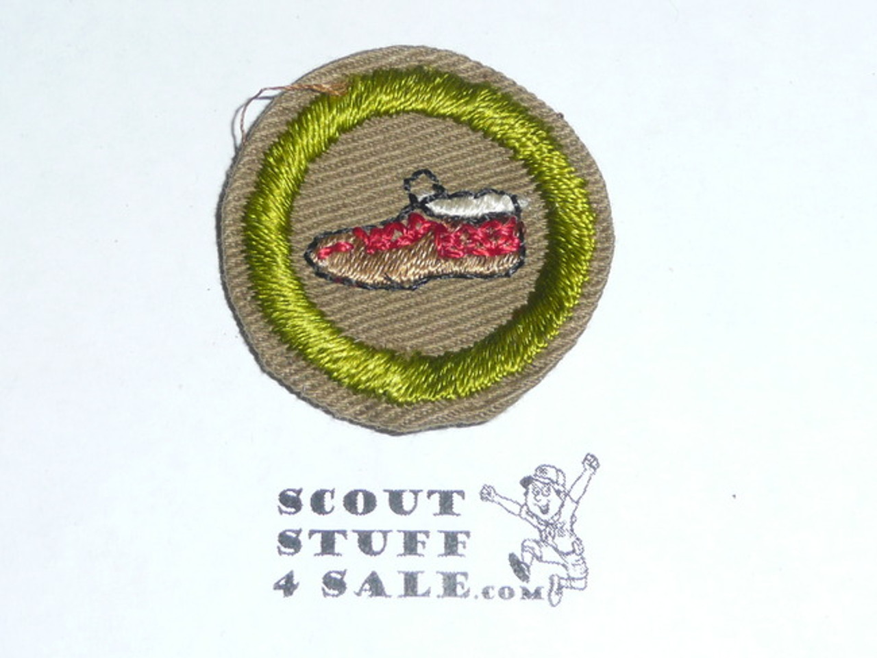 Leatherwork - Type C -  Tan Crimped Merit Badge (1936-1946)