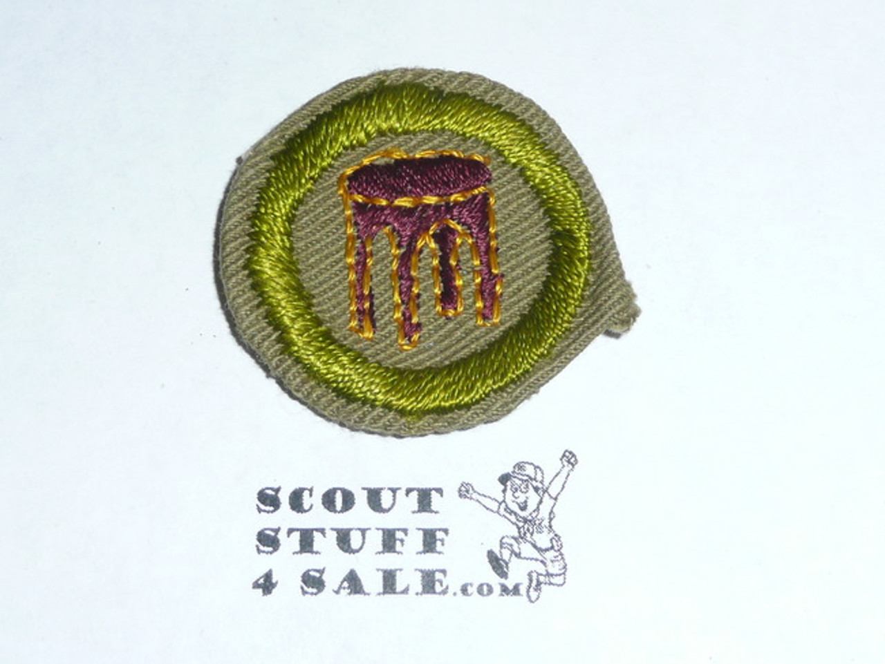 Woodwork - Type C -  Tan Crimped Merit Badge (1936-1946)