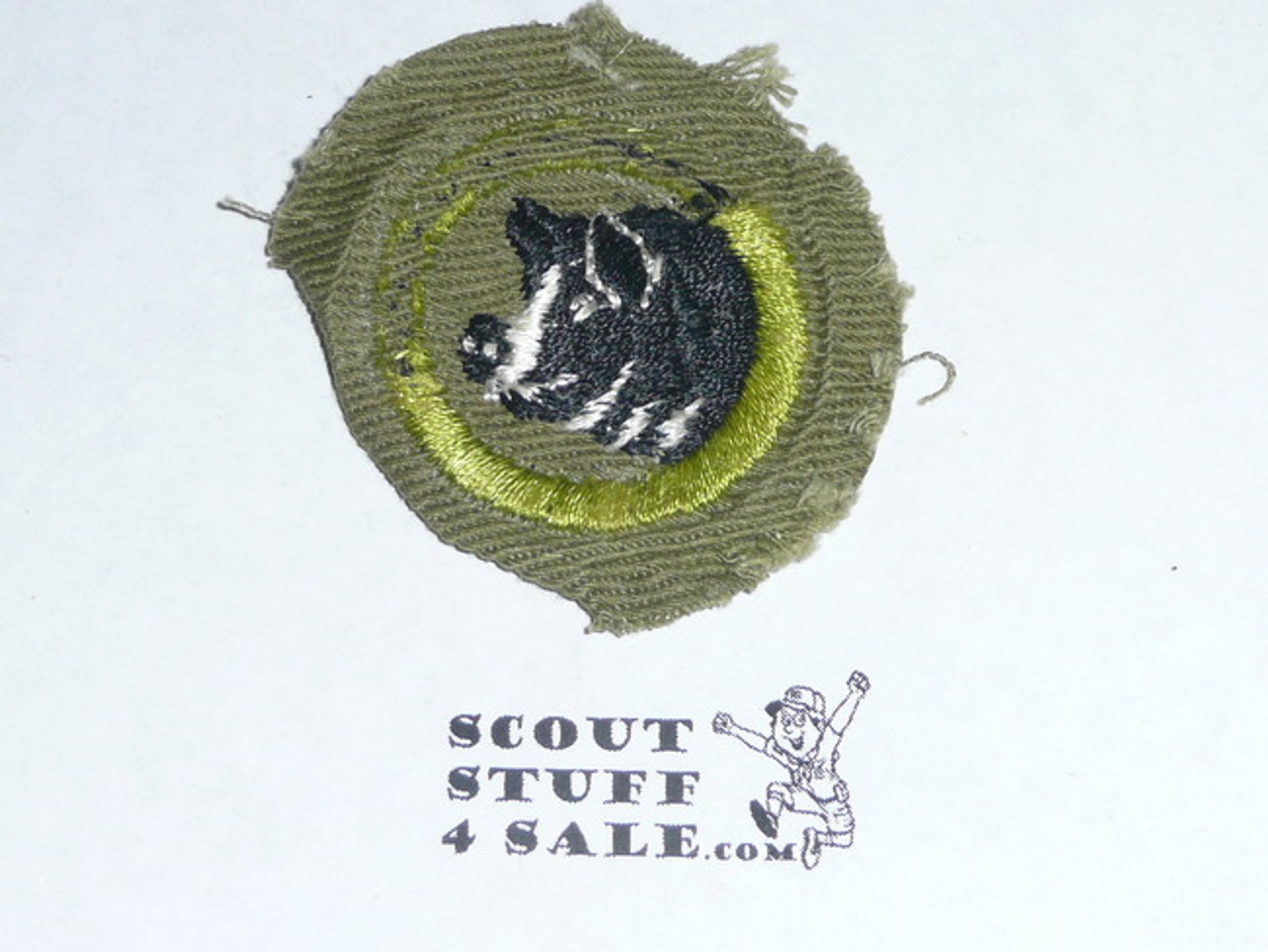 Hog Production - Type E - Khaki Crimped Merit Badge (1947-1960), used with bdr damage