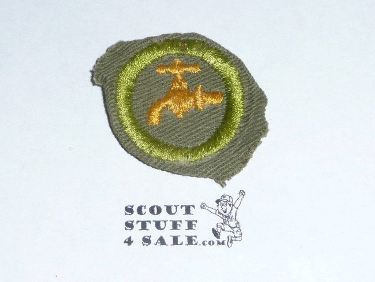 Plumbing - Type E - Khaki Crimped Merit Badge (1947-1960)